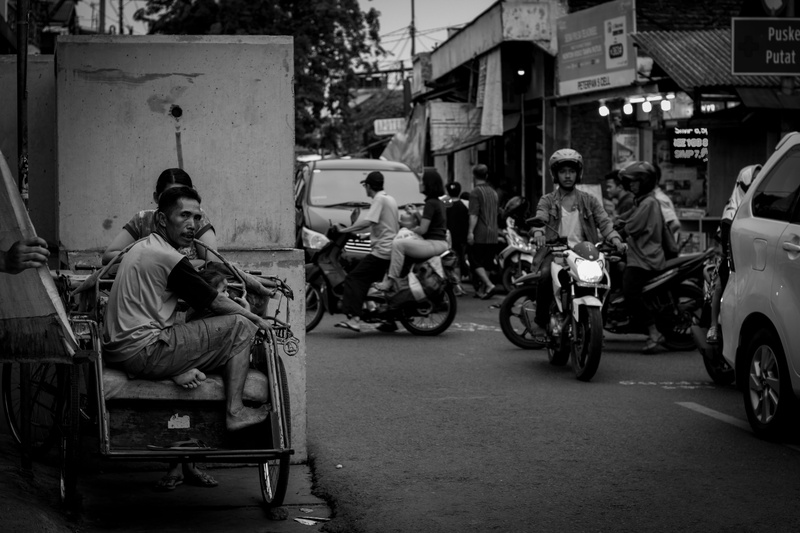 motorcycle, women, junction, woman, mode of transportation, building exterior, people, transportation, day, street photo, built structure, city, road, land vehicle
