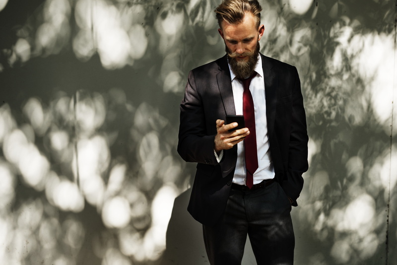 portable information device, interaction, businessman, outdoors, smart phone, white, males, pants, professional occupation, internet, black, entrepreneur