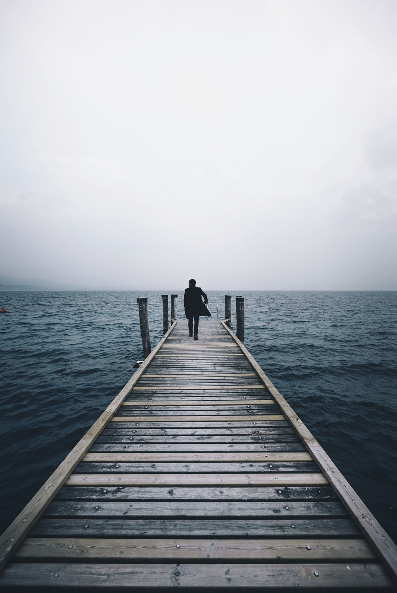real people, lake, horizon over water, one Person, water, sea, suit, ocean, middle, daytime, solitude, tranquil Scene, walking, jetty, port dock, pier