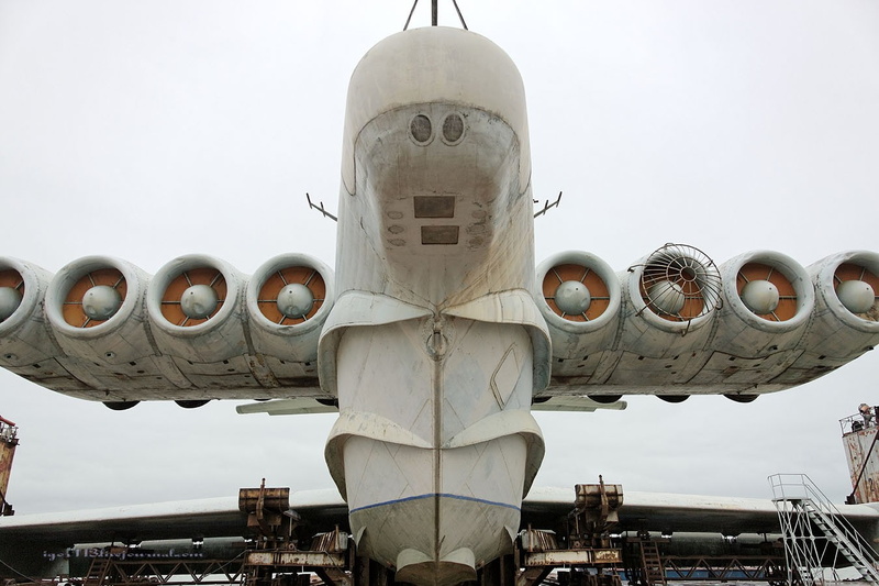 air vehicle, day, sky, outdoors, airplane, mode of transportation, nature, Lun class ekranoplan, 720P, aerospace industry, building exterior, clear sky