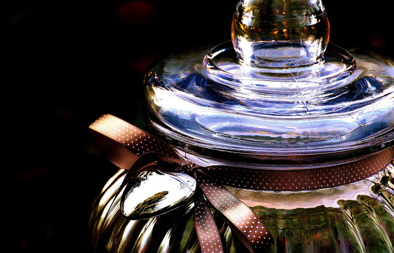 high angle view, loop, indoors, art and craft, reflection, close-up, silver colored, heart, candy-glass, still life, focus on foreground, shiny, bottle