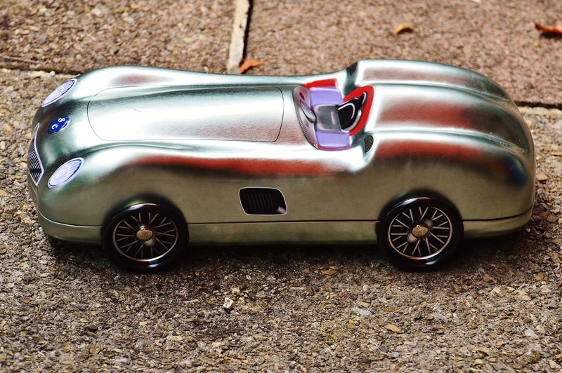 collectors car, vintage car, silver, 5K, high angle view, shiny, auto, sheet, transportation, cookie jar, mode of transportation, racing car, motor vehicle