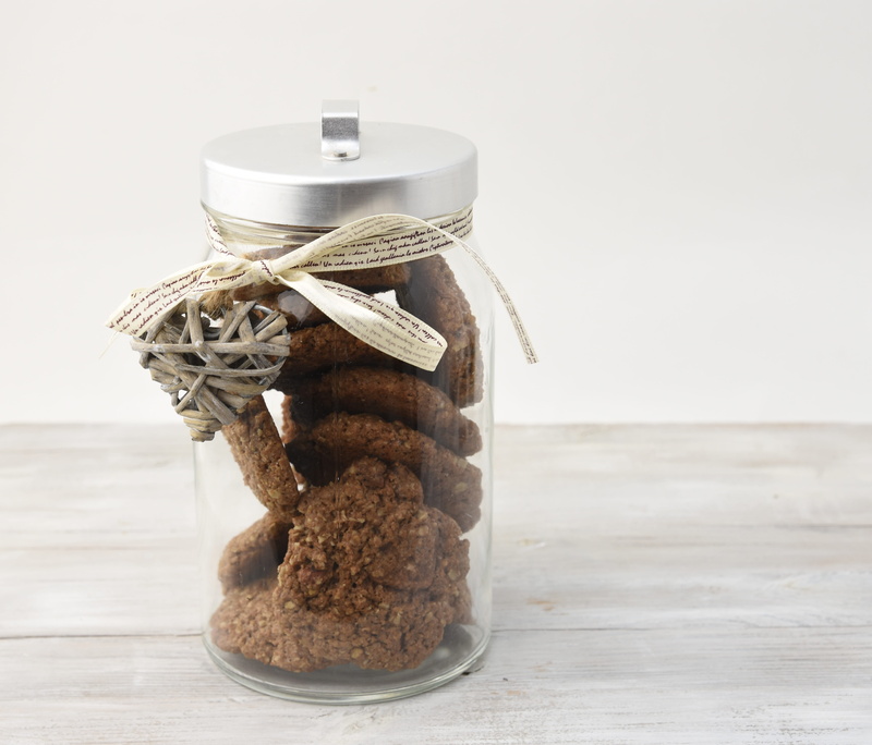 sweet food, container, jar, transparent, focus on foreground, food, tied up, wood - material, table, no people, food and drink, stack, brown, freshness