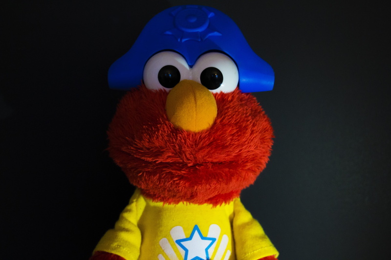 single object, black background, character, red, cut out, studio shot, 5K, Elmo, blue, representation, creativity, craft, Sailor, human face, Kids, indoors