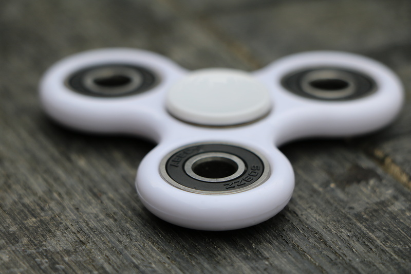 day, still life, spinner, 2017, indoors, play, white, focus, selective focus, close-up, toy, fidget spinner, focus on foreground, trend, silver colored