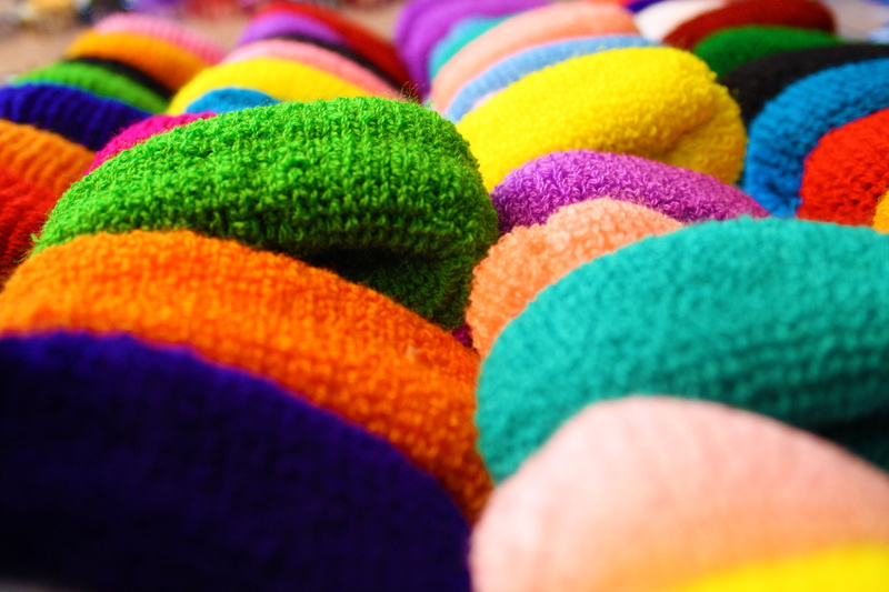 textile, selective focus, backgrounds, Textiles, hair, no people, close-up, softness, in a row, orange color, multi colored, large group of objects, background