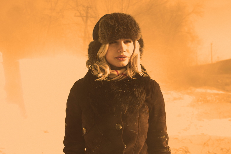 one person, women, coat, hat, ushanka, clothing, outdoors, looking, winter, wearing, female, weather, warm clothing, front view, sunset, beautiful woman