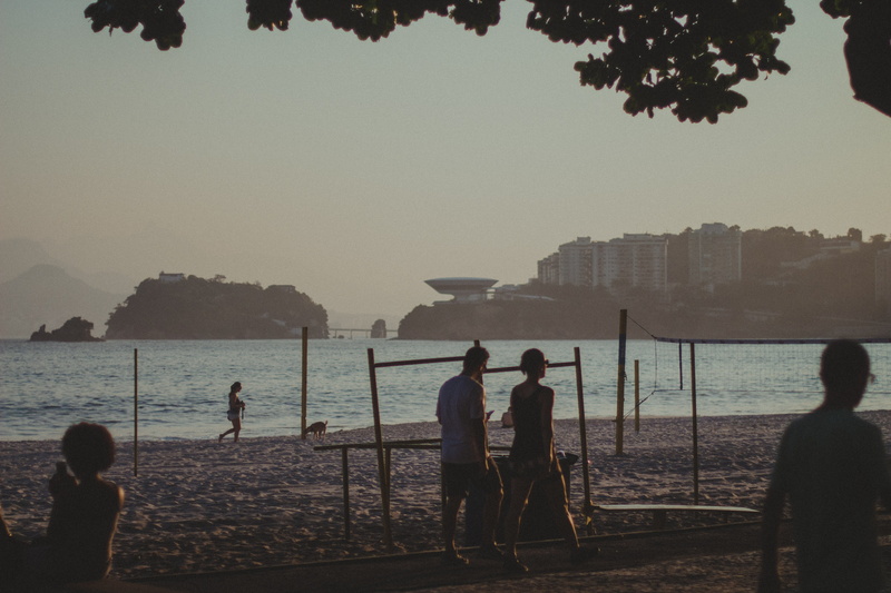 sky, brazilian beach, beach, outdoors, group of people, walking, men, tree, brazilian, adult, sunset, lifestyles, water, niterói, rocks, sea, real people