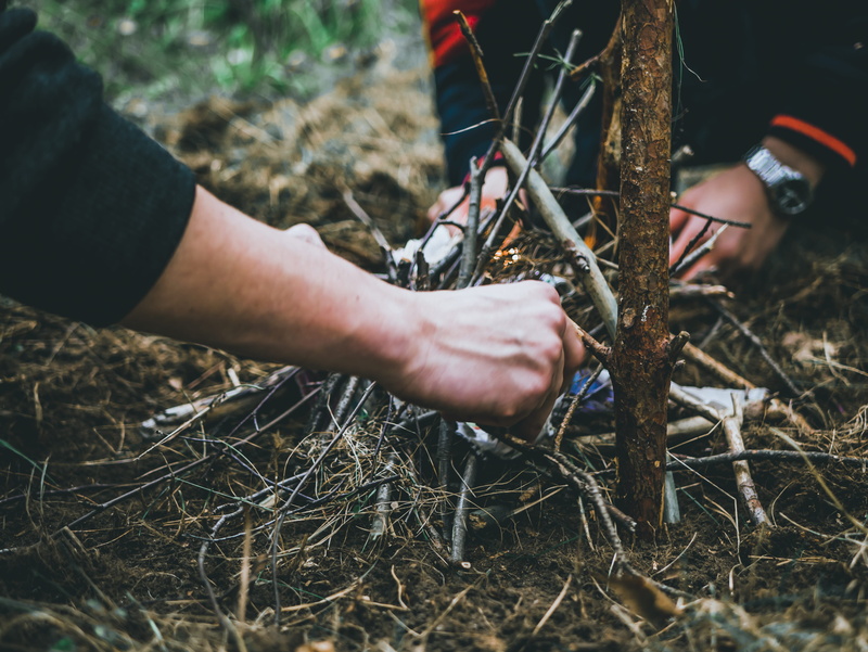 flame, people, body part, field, human hand, two, men, heat, plant, day, outdoor, real people, garden, land, hands, outdoors, fuel, adventure, adult, make