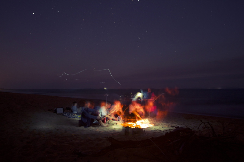 outdoors, bonfire, motion, flame, lit, BBQ, blur, fire, people, nature, beauty in nature, sand, heat - Temperature, fire - Natural Phenomenon, camping