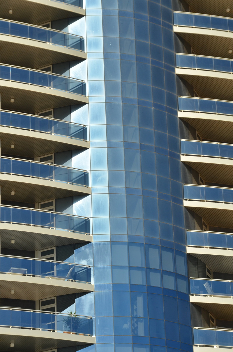 office building exterior, building, outdoors, low angle view, nature, glass - material, apartment, office, city, calp, modern, sky, skyscraper, reflection