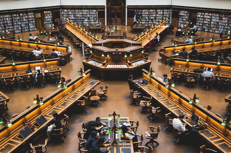 inside, motion, mode of transportation, architecture, u, building, s, tables, indoors, people, built structure, city, walking, books, transportation, incidental people