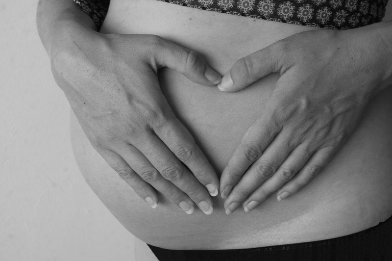 body part, human abdomen, couple - relationship, care, positive emotion, indoors, people, belly, pregnant woman, anticipation, midsection, pregnancy, emotion