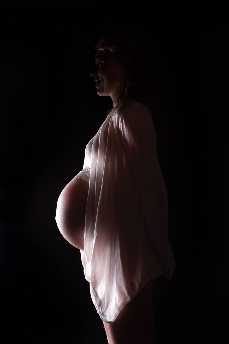 woman, mama, pregnant, love, sport, indoors, copy space, women, side view, belly, three quarter length, caucasian Ethnicity, baby, isolated On Black, 1080P