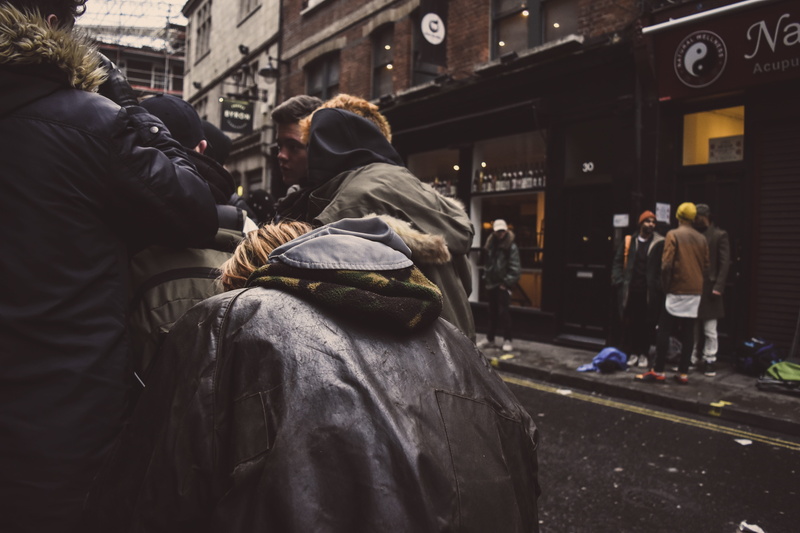 adults only, selective focus, leather, walking, urban Scene, street, social issues, people, wearing, building, black leather jacket, clothing, photography