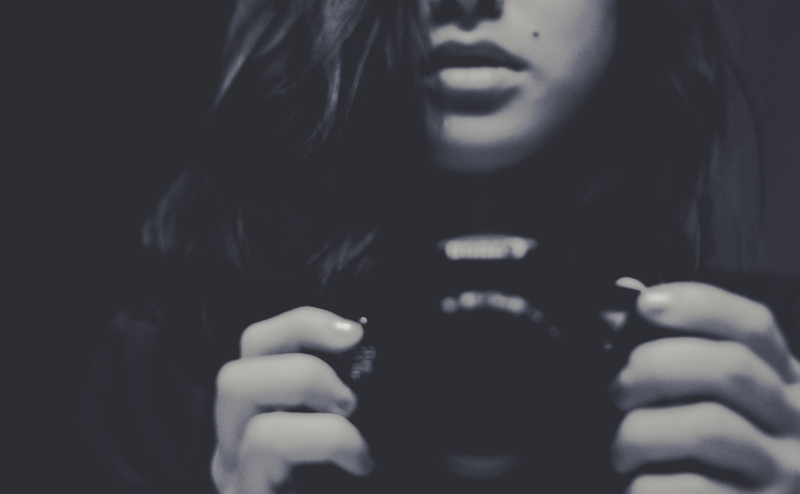 communication, young women, wireless technology, indoors, ideas, Mirror, real people, front view, Portrait, black background, lifestyles, selfie, leisure activity