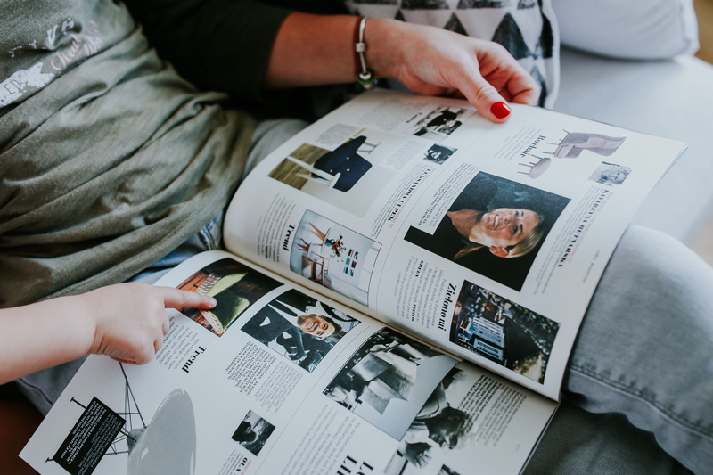 real people, men, magazines, communication, wireless technology, time, table, lifestyle, indoors, read, magazine, finger, human Hand, finance, human body part