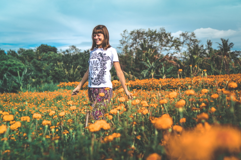 agriculture, hairstyle, beauty in nature, shirt, growth, photo, crew, nature, lady, marigold, one person, sky, outdoors, young, cloud - sky, three quarter length