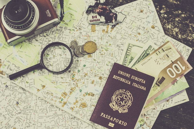 paper currency, currency, magnifying glass, wealth, no people, business, still life, beside, western script, indoors, technology, table, book, placed, camera