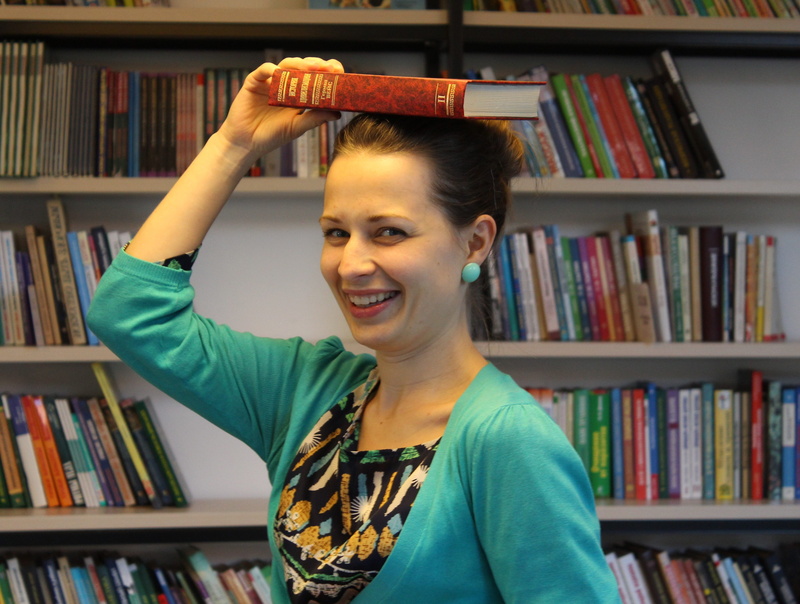 development, reading, library, publication, placing, holding, human limb, top, hairstyle, one person, adult, read, beautiful, head, human arm, learning