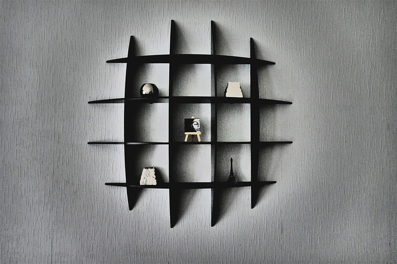 studio shot, close-up, order, simplicity, artistically, confused, 5K, medium group of objects, floating, wood - material, directly above, no people, wall - building feature