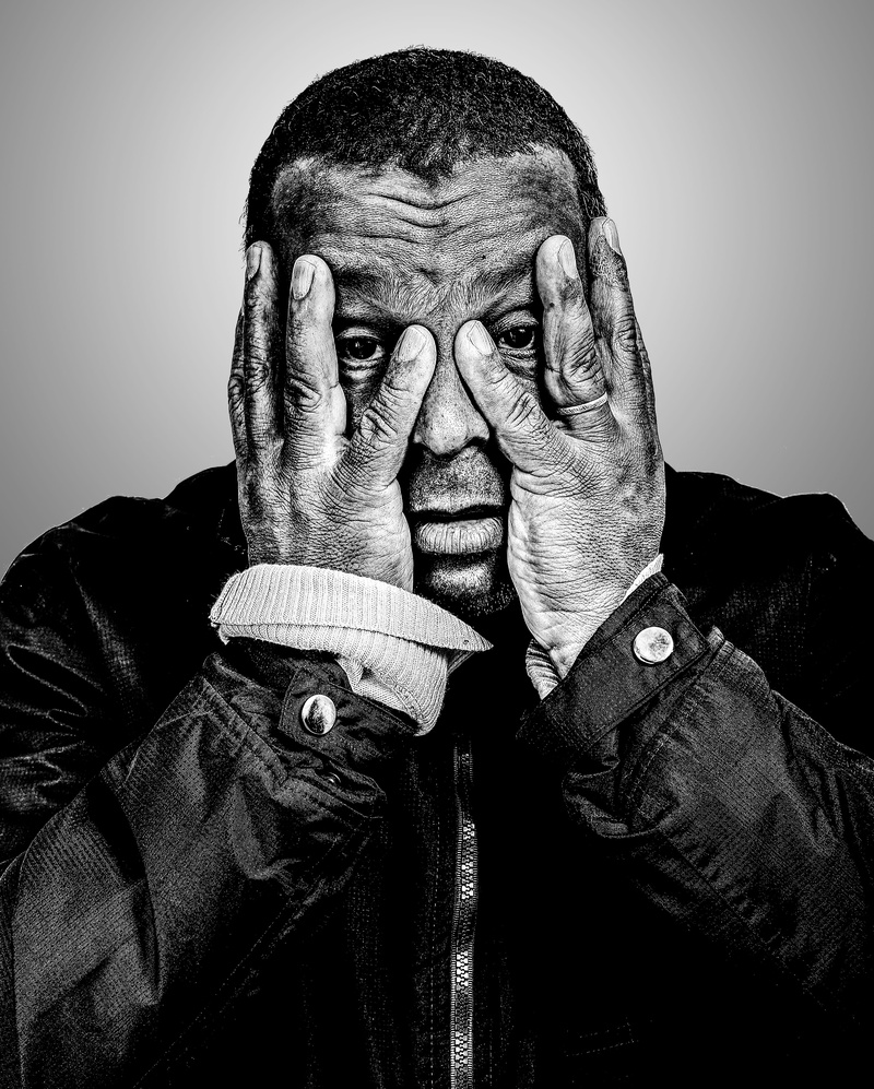 hand, wall - building feature, brazil, men, leather, casual clothing, peace, clothing, portrait, human face, indoors, black man, obscured face, males, one person