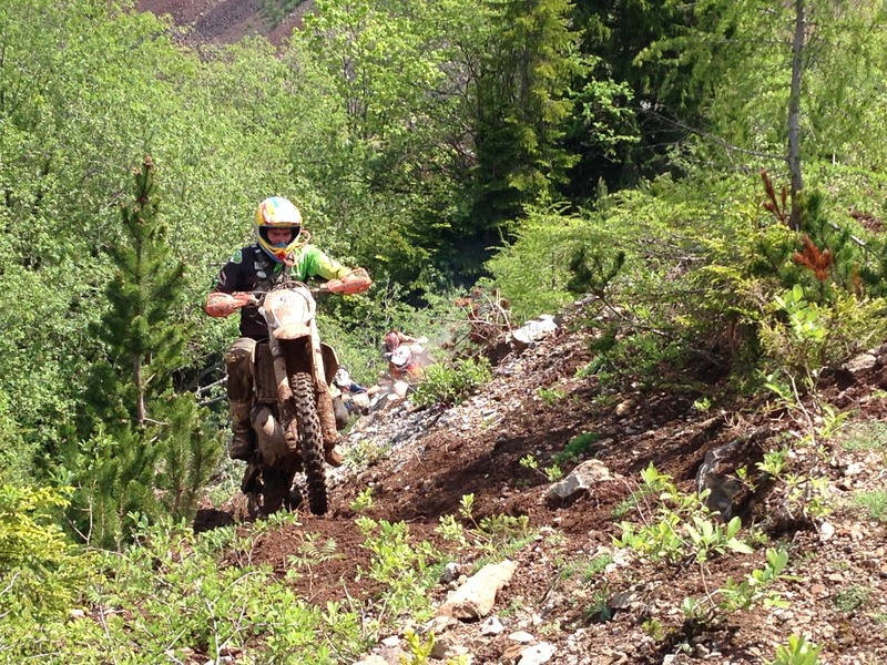 uniform, day, forest, sunlight, ore mountain, outdoors, front view, green color, motocross, government, men, helmet, land, motorcycle, growth, headwear