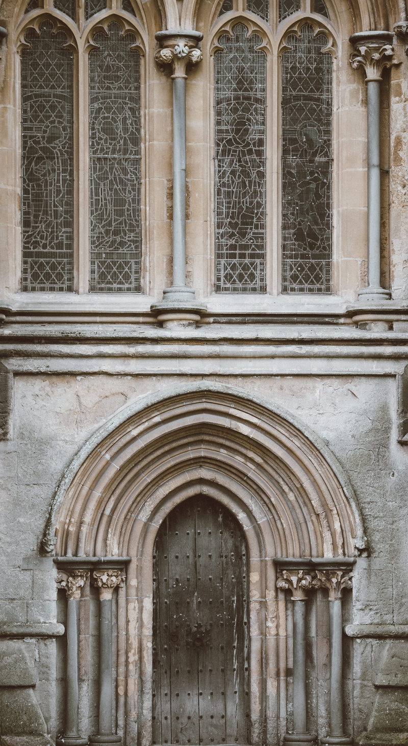 arch, entrance, place of worship, building exterior, wells, architecture, window, built structure, religion, belief, concrete, ornate, history, day, no people