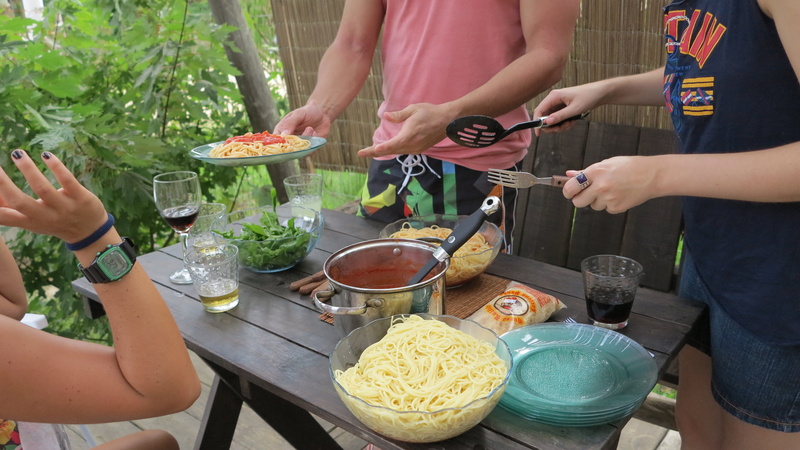 enjoy, holidays, holding, table, human body part, men, pasta, women, friendship, rucula, summer, eat, food and drink, young adult, preparation, wine, punta rubia