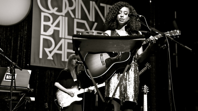 woman, arts culture and entertainment, sound, grayscale, photography, holding, performer, men, playing, women, caucasian Ethnicity, indoors, show, guitar