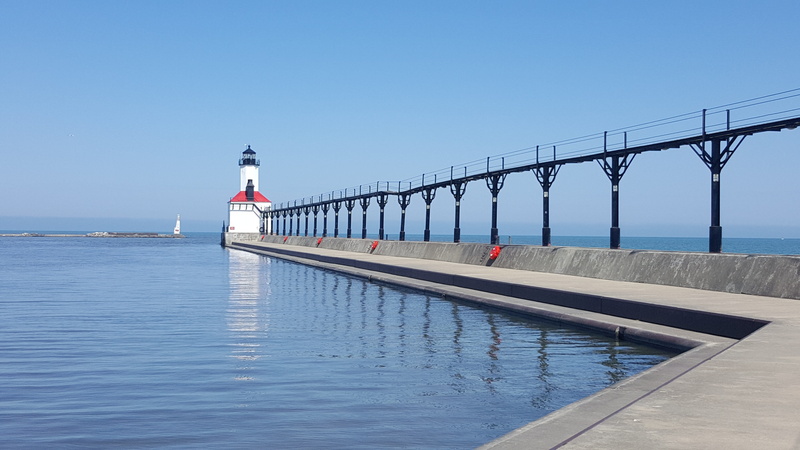 connection, indiana, copy space, architecture, landscape, water, lighthouse, usa, blue, outdoors, direction, bridge - man made structure, sea, transportation