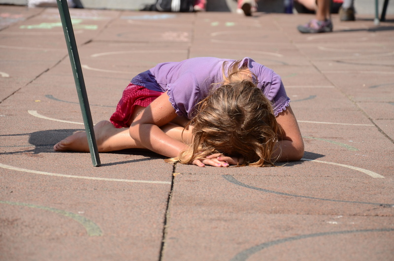 floor, lying down, relaxation, crying, boys, leisure activity, lifestyles, men, young, unhappy, shadow, girl, outdoors, shirt, childhood, casual clothing