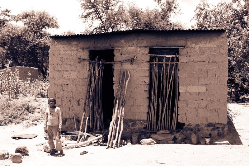 architecture, field, real people, standing, african, wood - material, full length, day, poverty, africa, no people, outdoors, culture, poor, abandoned