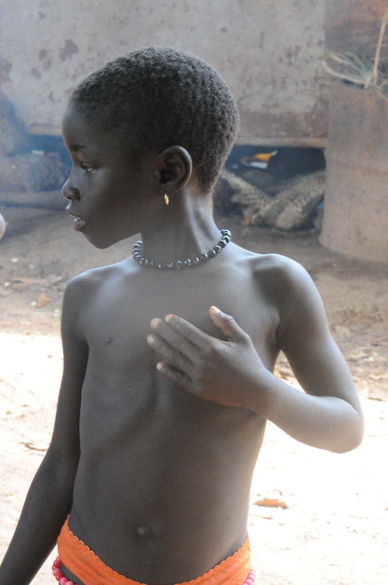 africa, land, poverty, african, art and craft, shirtless, rear view, misery, 4K, guinea, profile, sunlight, looking, leisure activity, poor, female, focus on foreground