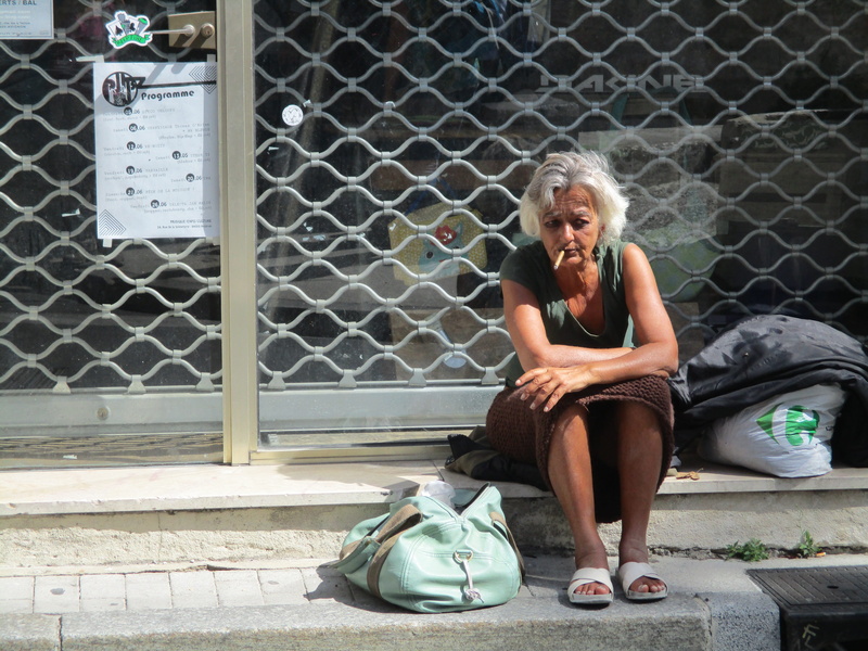 real people, females, seating, human, near, homeless, day, full length, scoop neck, front view, adults only, scoop, wearing, teal, sad, lifestyles, social issues