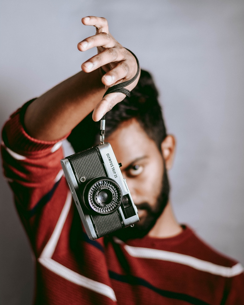 skin, strap, studio shot, headshot, photography themes, technology, human, screen, photographer, person, video camera, photography, focus on foreground