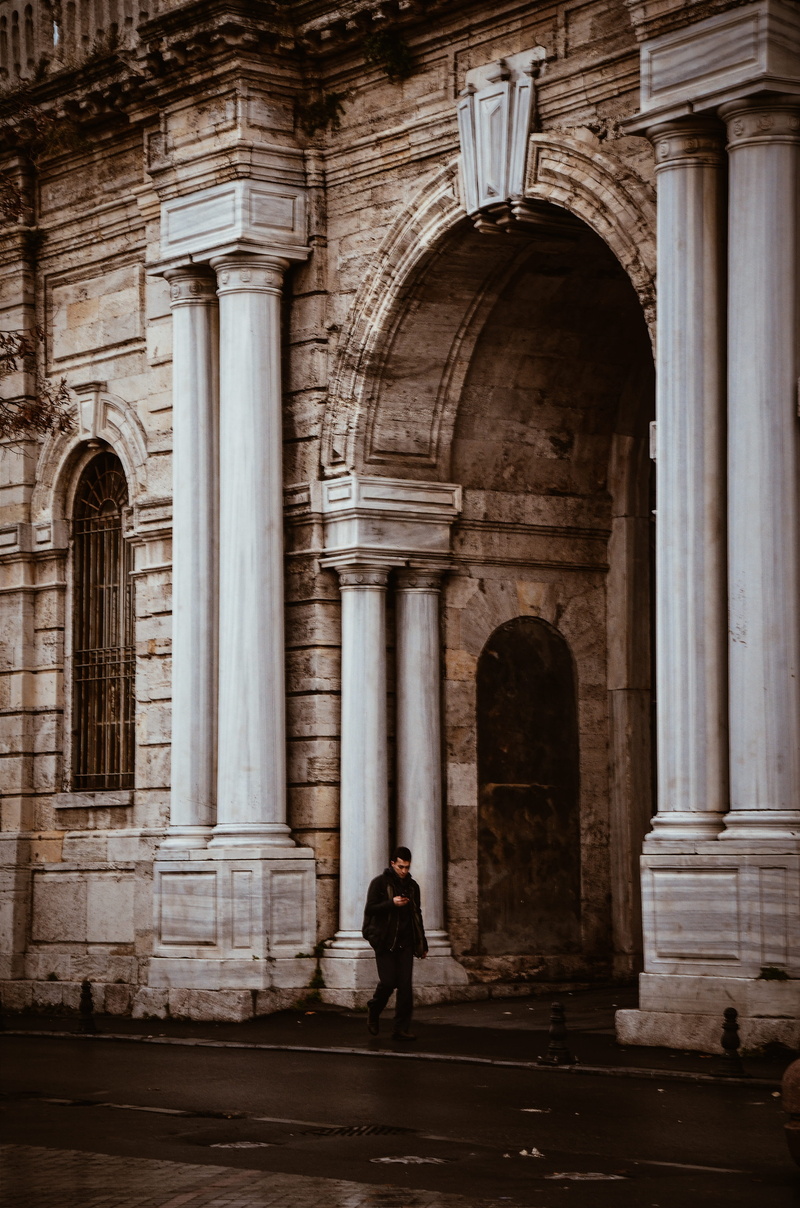 culture, built structure, photography, wall, outdoors, adult, history, person, daylight, belief, columns, arches, standing, building exterior, landmark