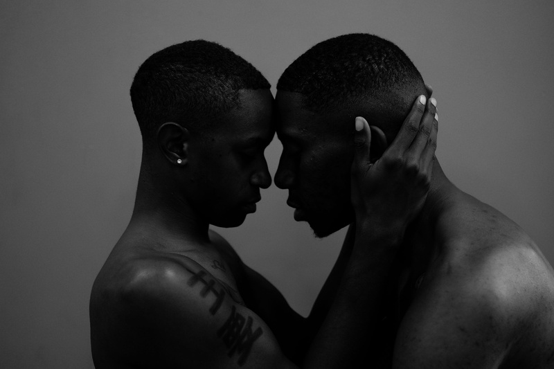 dark, faces, young adult, gray background, side view, gray, embrace, gay, young men, photoshoot, photo, togetherness, men, indoors, facial expression, 2K