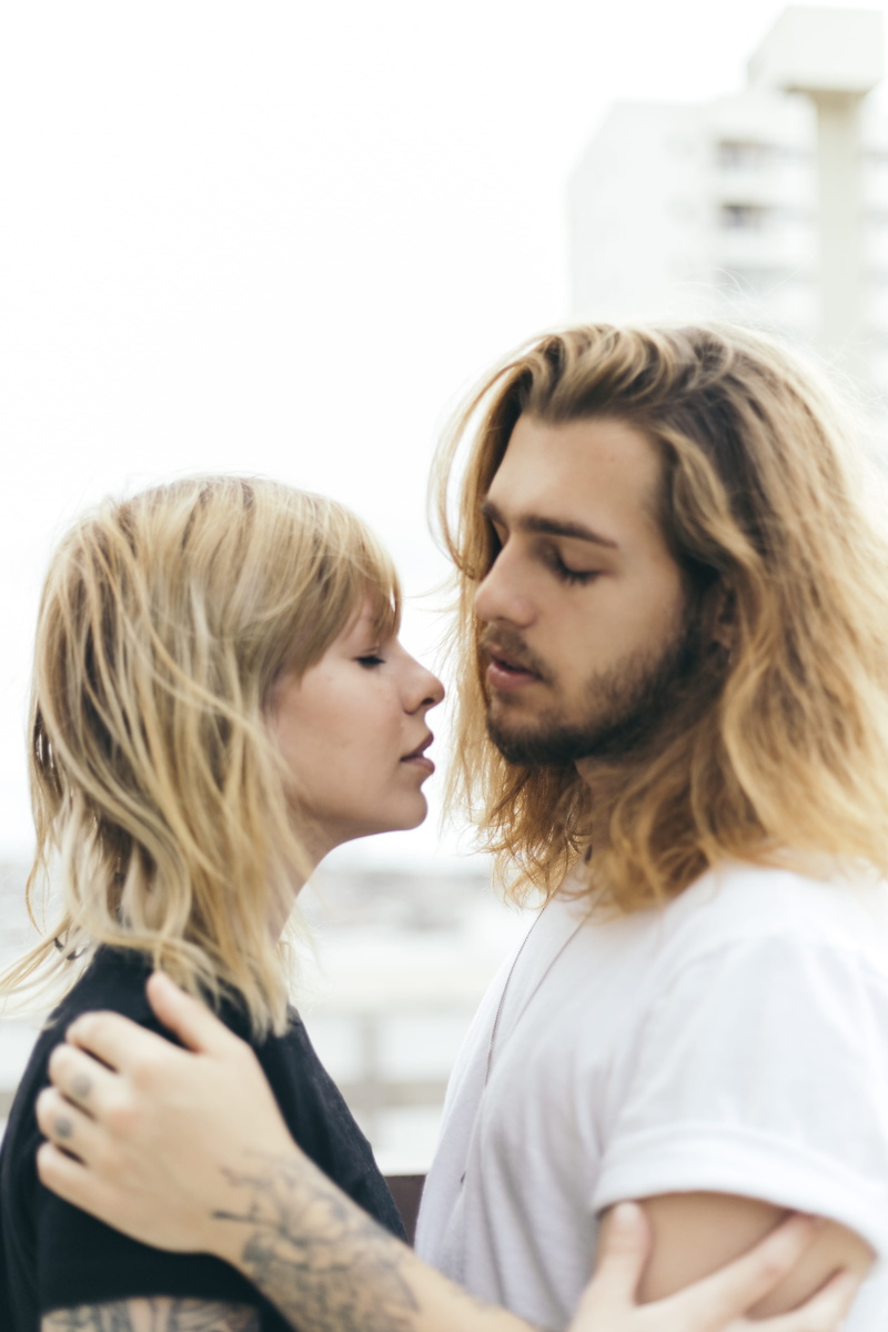 in love, bonding, wear, white, women, tattoo, casual, beautiful, females, kissing, relationship, looking, t, love, people, shirt, facial expression, romantic