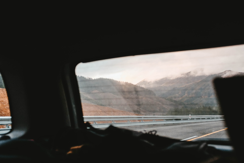 car travel, motion, glass - material, on the road, no people, vue, windshield, road trip, nature, transportation, mode of transportation, road, day, mountain
