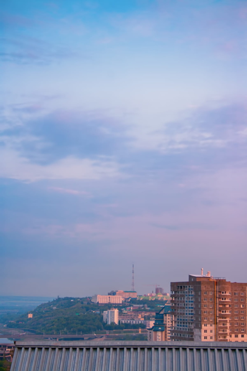 travel destinations, nature, tower, residential district, building, day, scene, city, skyline, built structure, water, skyscraper, architecture, outdoors