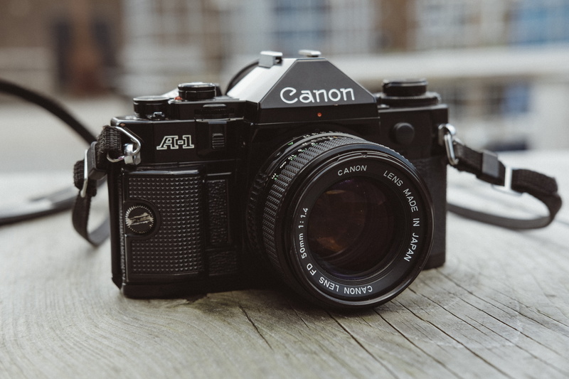 film, dept of field, photographic equipment, text, lens - optical instrument, photography, photographing, photography themes, 50mm, retro styled, black color