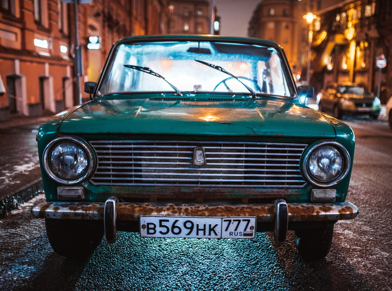architecture, retro styled, street, building exterior, murat, text, communication, city, parked, illuminated, roadside, headlight, motor vehicle, no people