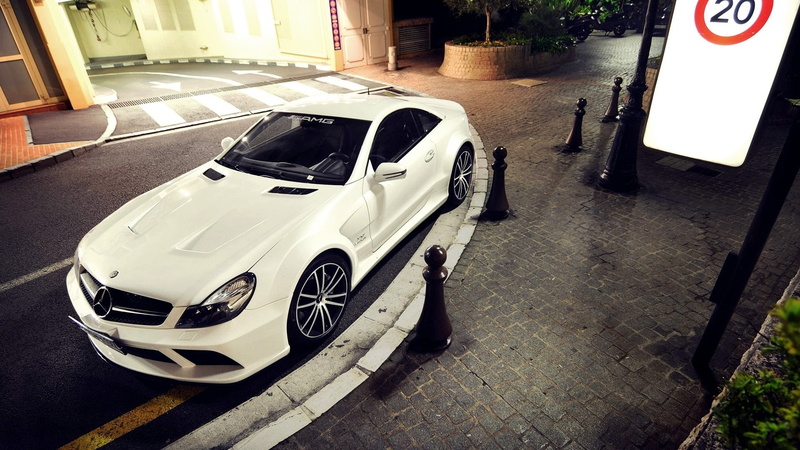 building exterior, mode of transportation, door, supercars, parking, travel, transportation, city, Mercedes-Benz, high angle view, land vehicle, no people