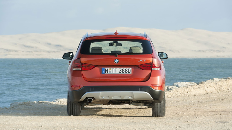 x, car, red, sand, bmw, nature, motor vehicle, transportation, outdoors, no people, sea, day, BMW X1, beach, land vehicle, series, scenics - nature, sunlight