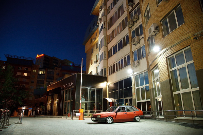 building exterior, stance, illuminated, city, tuning, yard, red, car, high-rise building, 2K, outdoors, built structure, nature, window, transportation