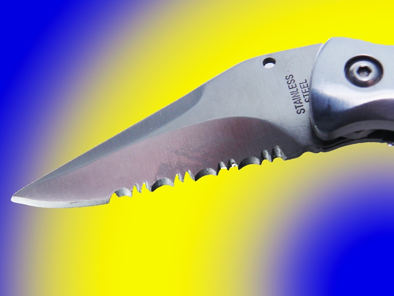 ground, 2K, colored background, steel, creativity, focus on foreground, cut, scalloped edge, knife, blue background, single object, indoors, razor sharp