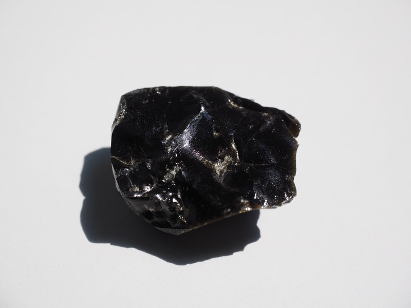 4K, volcanic, geology, obsidian, black, close-up, indoors, rock - object, copy space, volcanic rocks glass, shiny, black color, white background, solid