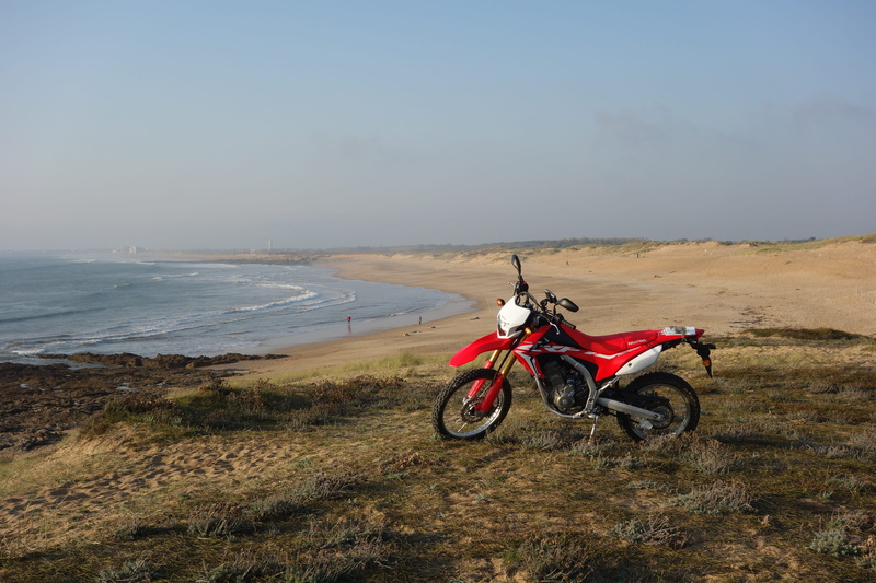 byke, soil, nature, machine, headwear, scenics - nature, crash helmet, helmet, landscape, water, road, sky, beach, day, sports helmet, human, plage, outdoors