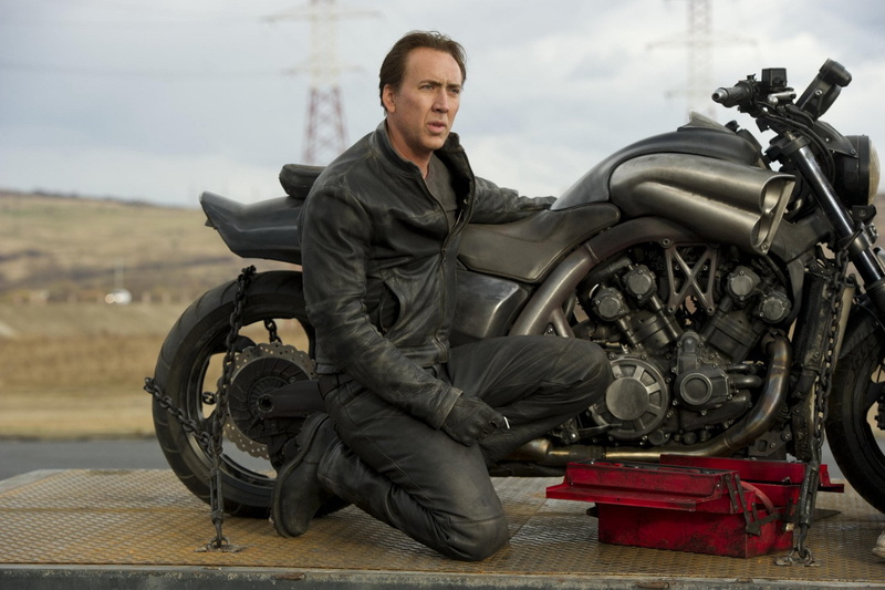 sitting, leisure activity, adult, 1080P, one person, front view, tire, Ghost Rider: Spirit of Vengeance, real people, land vehicle, transportation, outdoors